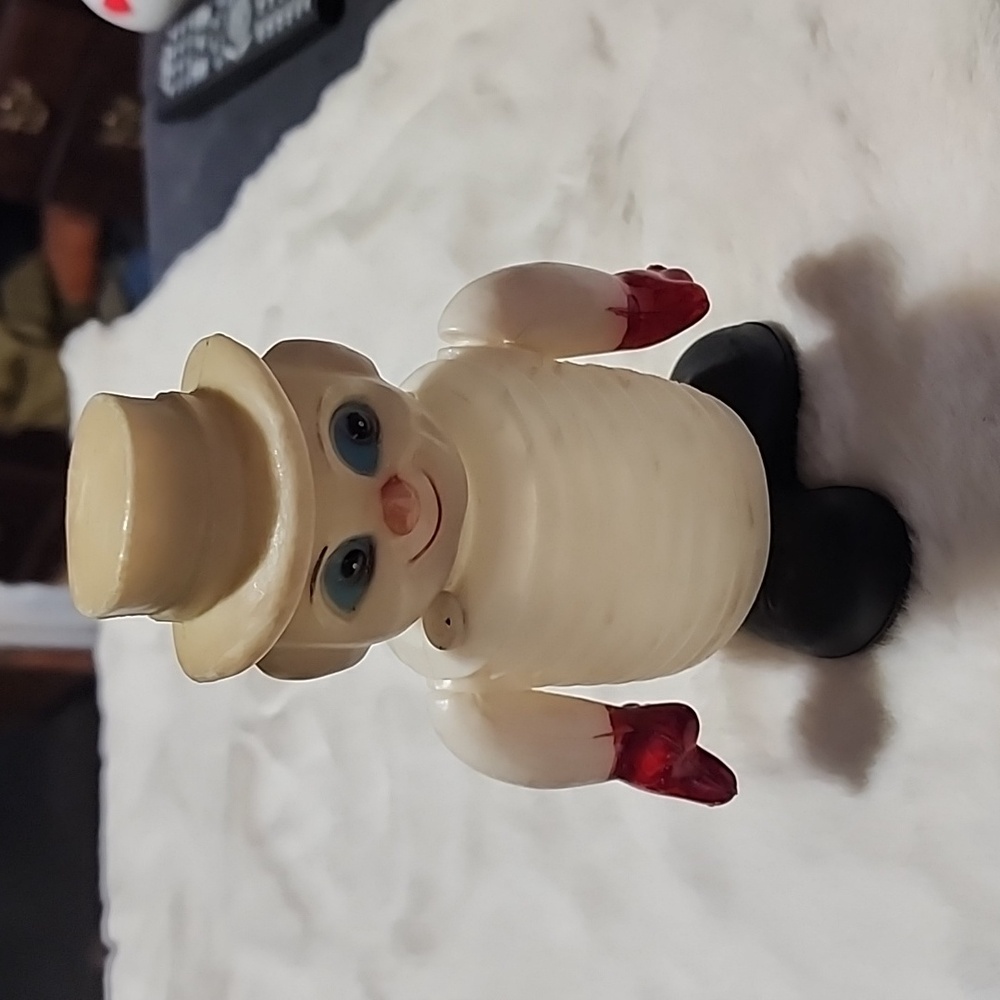 VINTAGE  SQUEAKER MAN TOY.